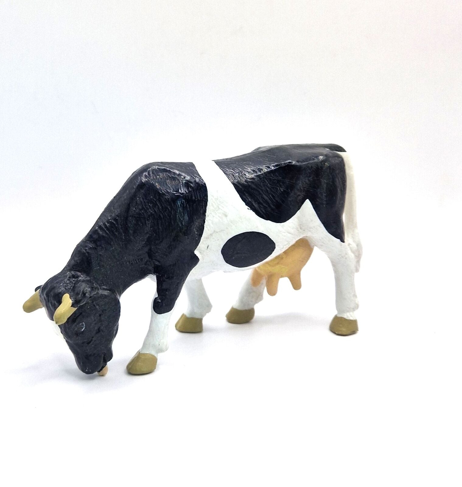 Schleich 13207 Kuh schwarz/weiss grasend